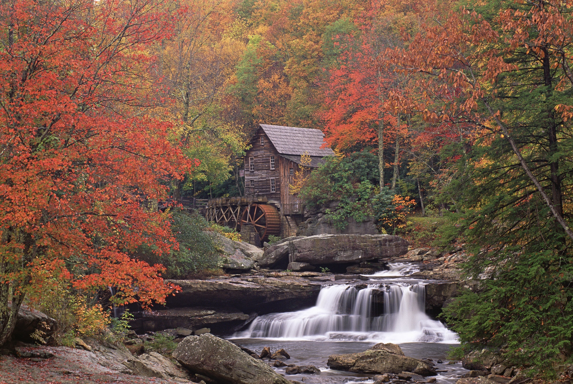 A historic grist mill building on the banks of Glade Creek in West Virginia.